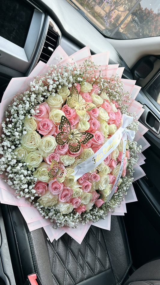 100 White & Pink Roses with Baby Breath with Pink Transparent Wrapping