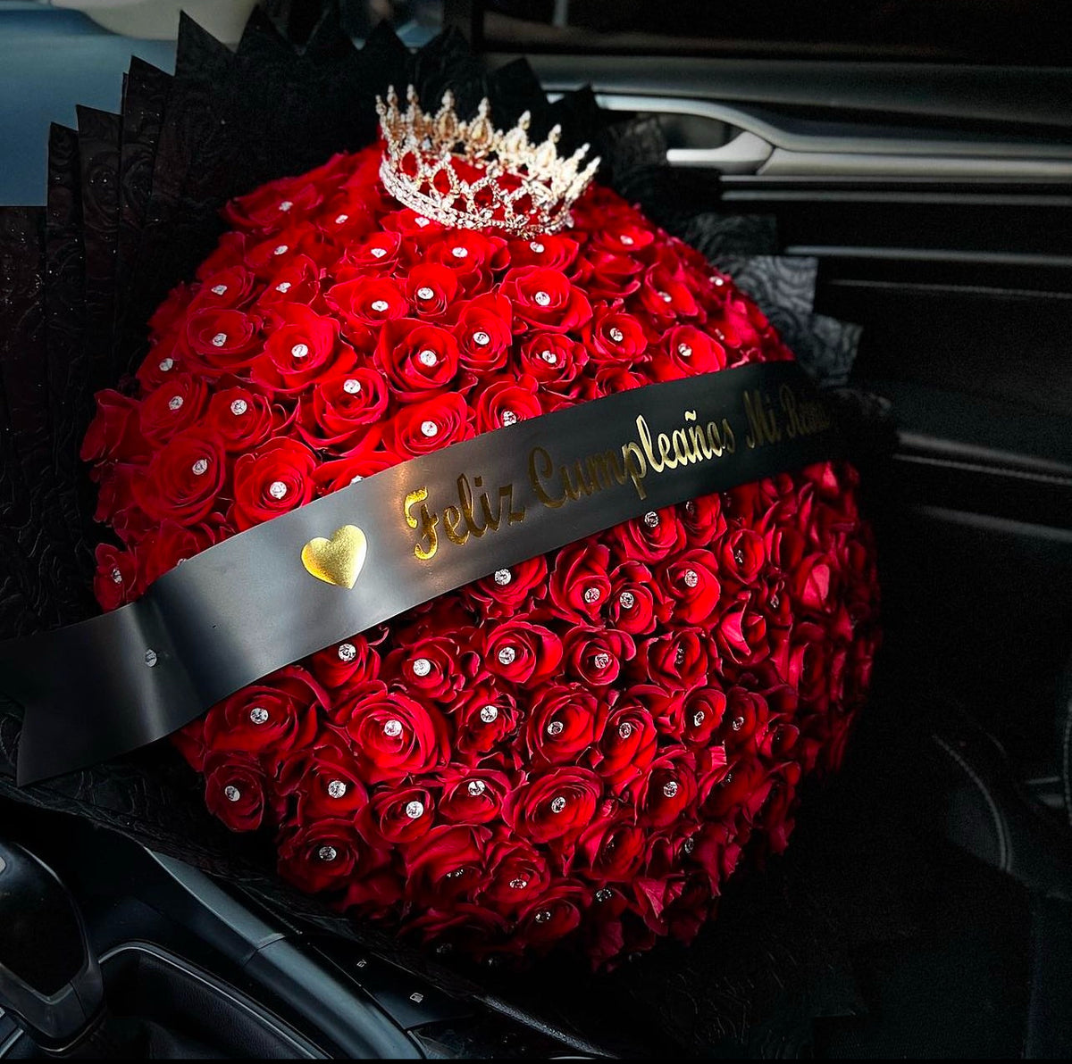 150 Red Roses with Black Rose Print Wrapping