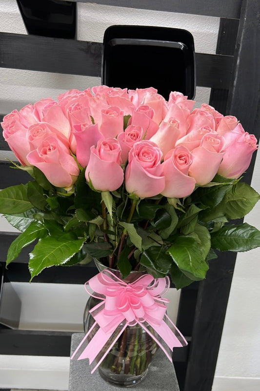 Vase of pink roses