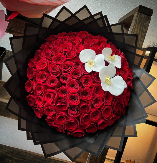 100 Red Roses with Orchids with Black Transparent Wrapping
